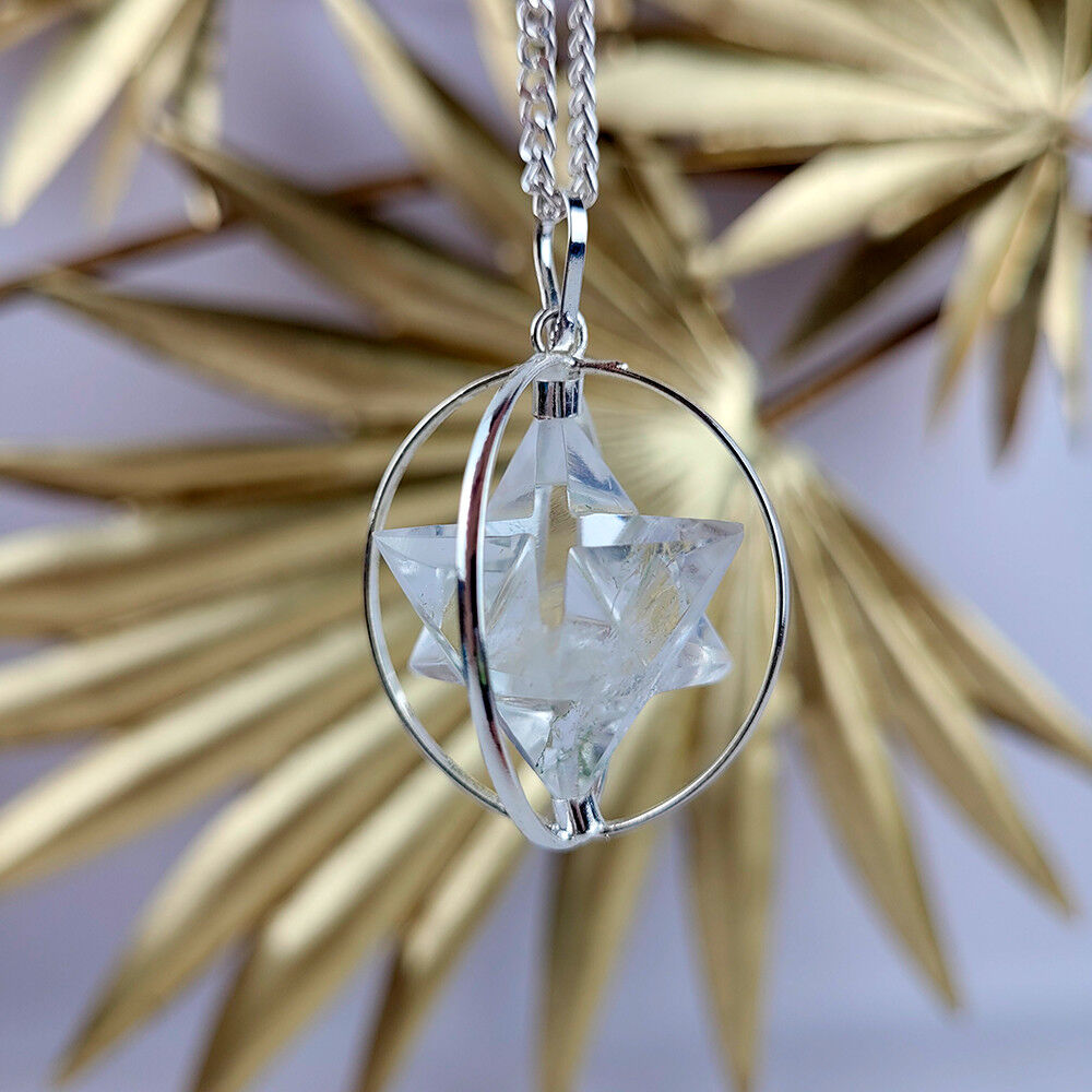 Pendente Merkaba in Cristallo di Rocca con sfera in metallo